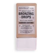 Bright Light Bronzing Drops Bronze Scorched / Light / Medium - Makeup Revolution.