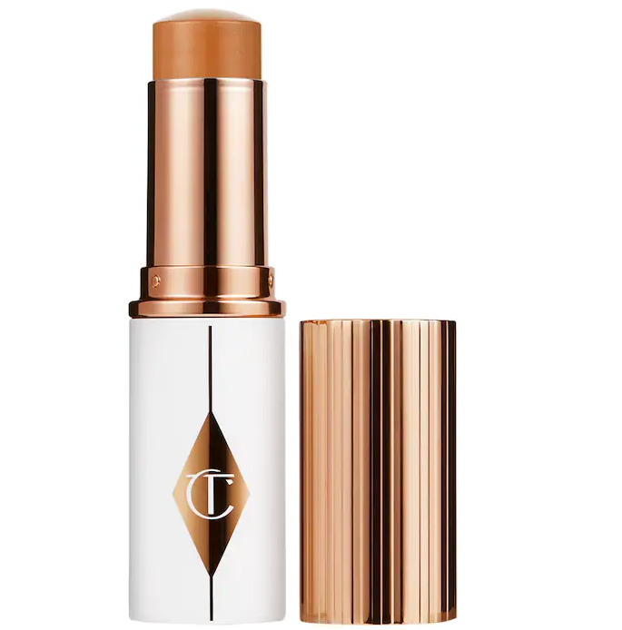 Unreal Skin Sheer Glow Tint Hydrating Foundation Stick / 10 Tan - Charlotte Tilbury.