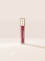Stay Vulnerable Glossy Lip Balm / Nearly Mauve - Rare Beauty.